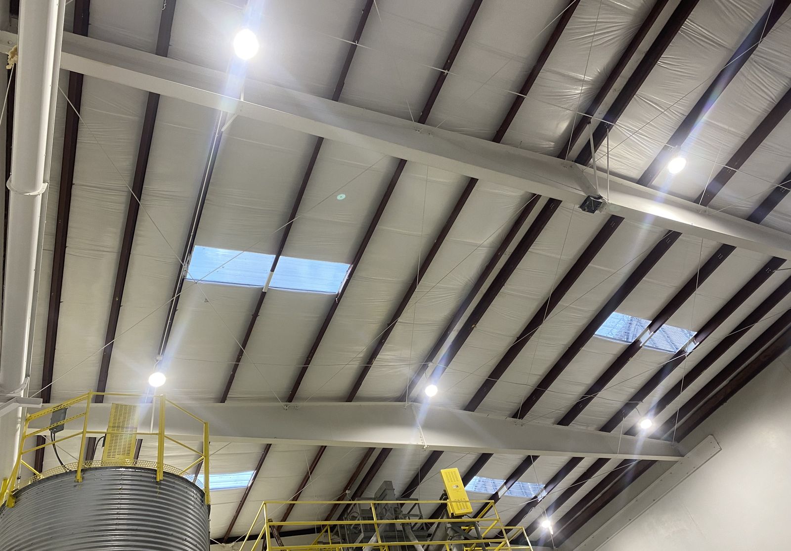 New metal building insulation over production area